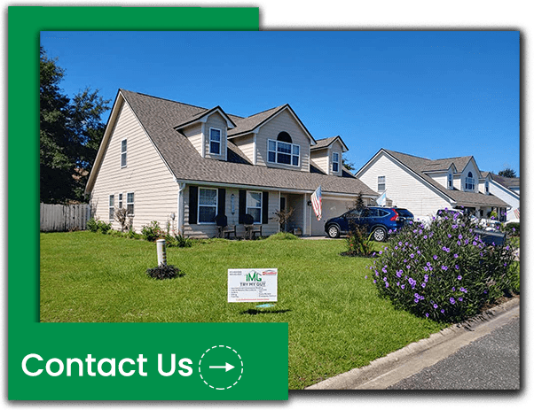 Mid-class home recently worked on by TryMyGuy, with their sign on the front yard